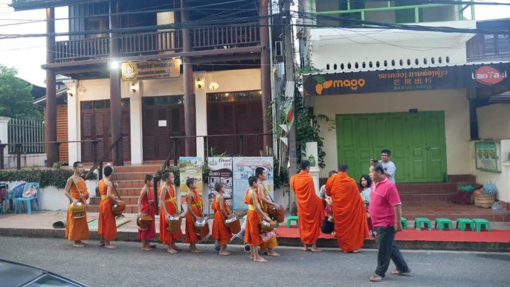 luangprabang-laos-2 - Laos Travel Company - Trips & Tours Monks getting food